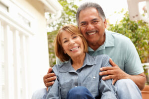 Older couple sitting on steps 